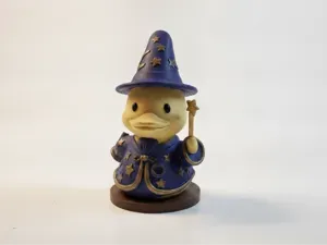 Yellow Rubber Duck Wearing Wizard Robe With Stars