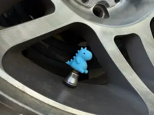 Valve Stem Caps : Small Sitting Dino!