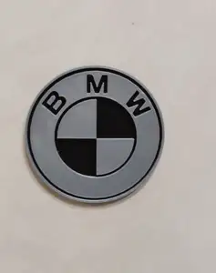 BMW logo badge with holes for magnets