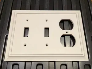 Decorative Double Toggle/Outlet Combo Cover Plate