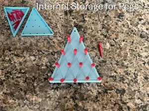 Peg Triangle Game with Storage for Pegs