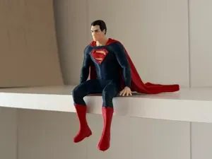 Superman / Man of Steel Sitting On Shelf | AMS