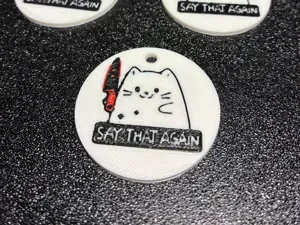Keychain Cat with a Knife – "Say That Again" - AMS