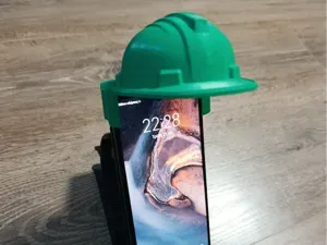 Construction helmet cellphone shade