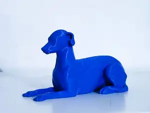 Greyhound seated sculpture