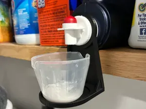 Laundry detergent cup holder