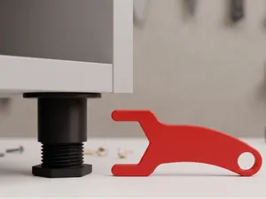 Pied de meuble réglable avec sa clé de serrage 