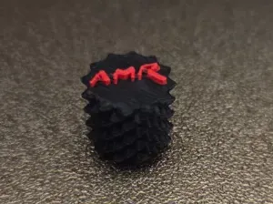 Tire valve cap Aston Martin Racing logo