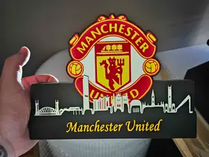 Lightbox Manchester United with skyline