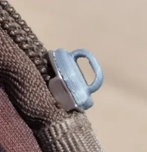 Zipper pull tab