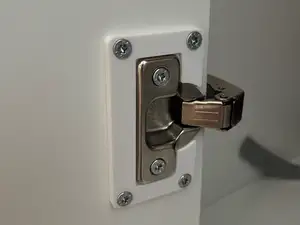 Cabinet hinge repair plate