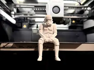 Sad Storm Trooper sitting on a ledge Figurine!