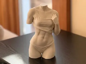 Bust of fit woman in flowy tank top