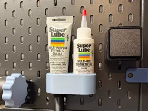 Super Lube holder for SKADIS
