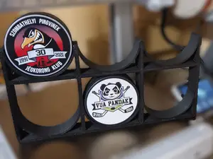 hockey puck stand