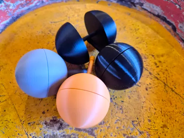 Split Sphere Spinning Top — Image 2 of 5