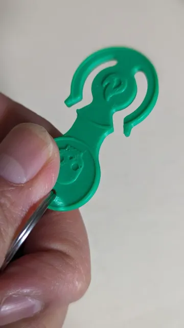 Escapable Trolley Token: Australian $1 Coin — Image 2 of 3