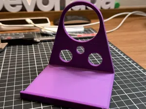 Suporte de tomada para carregar celular