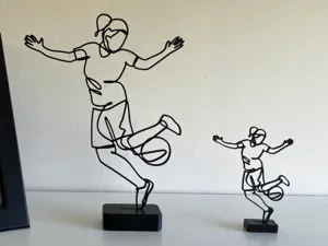 Female Footballer Line Art Sculpture