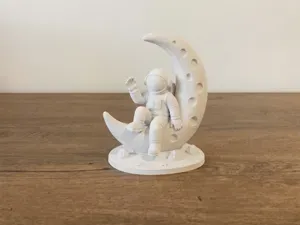 Astronaut Sitting on the Moon - Space Decoration
