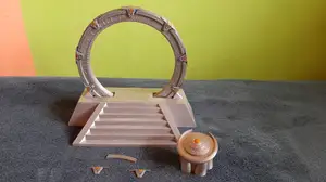 Stargate in an off-world pedestal with a DHD