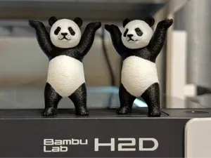 Put Your Hands Up! Adorable Twin Pandas