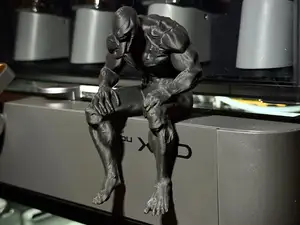 Sad Venom Figurine sitting on a ledge!