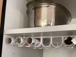 Rolls of kitchen foil and film organizer