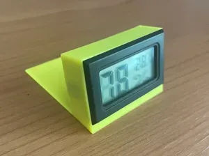 Thermometer stand. For dry box (Cereal container)