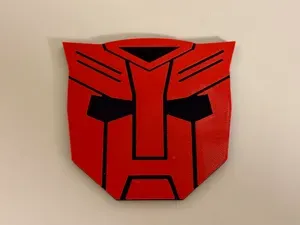 Transformers Autobot over Tesla Emblem Logo Cover
