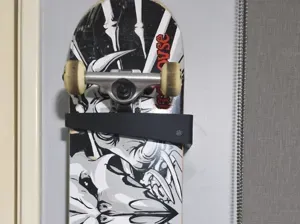 Skateboard vertically oriented wall mount bracket