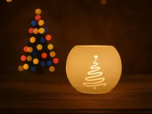 Tealight holder with packages and tree