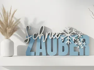 00125 Schriftzug Schneeflockenzauber