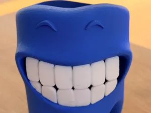 Porte-brosse à dents souriant