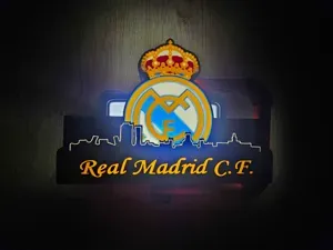 Real madrid CF lightbox with skyline of madrid