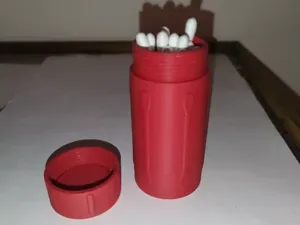 Travel container for cotton swabs