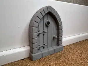 Baseboard Mouse Door