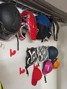 Wall mounted motorcycle helmet holder
