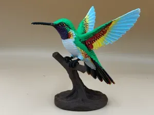 Prismatic Wings – Hummingbird in Flight
