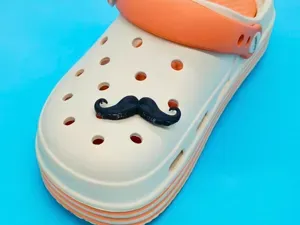 Mustache croc charm