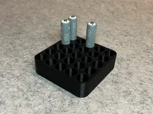 Battery holder for 25 AAA batteries