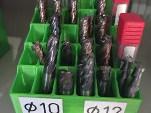 Holder for milling cutters and drill bits