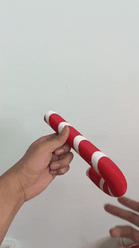 Twist-Extend Candy Cane Saber — Mechanical Toy