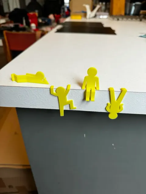 funny figure of a man sitting lying down