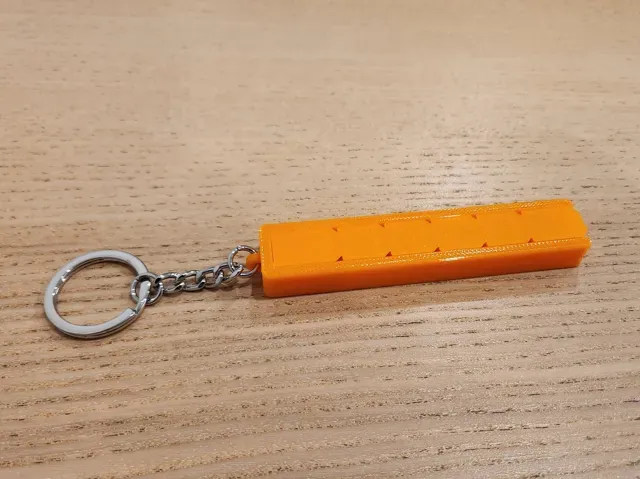 Magnetic zipper tear-strip fidget keychain — Image 4 of 4