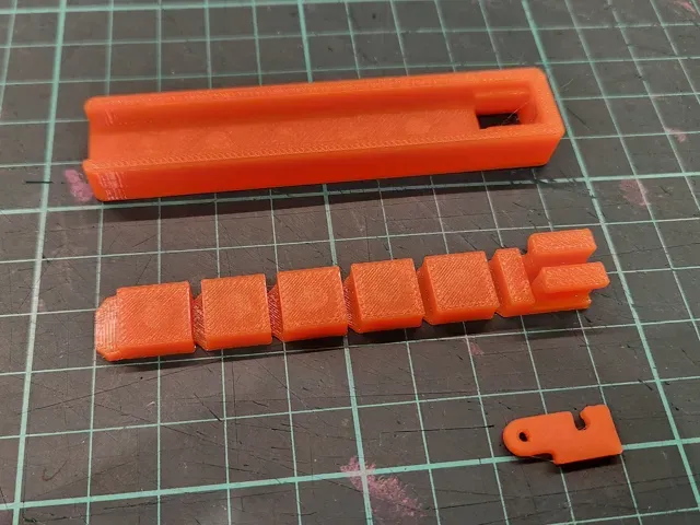 Magnetic zipper tear-strip fidget keychain — Image 3 of 4