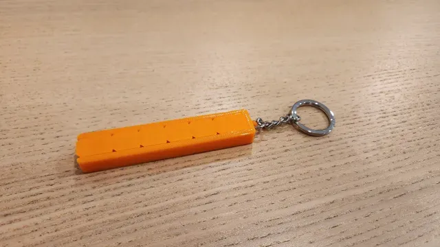 Magnetic zipper tear-strip fidget keychain — Image 2 of 4