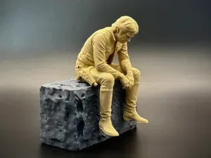Sad Han Solo Star Wars Figurine sitting on ledge!