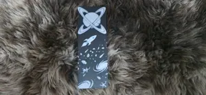 Intertwined Rings Planet and Rocket Bookmark