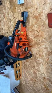 Chainsaw wall holder